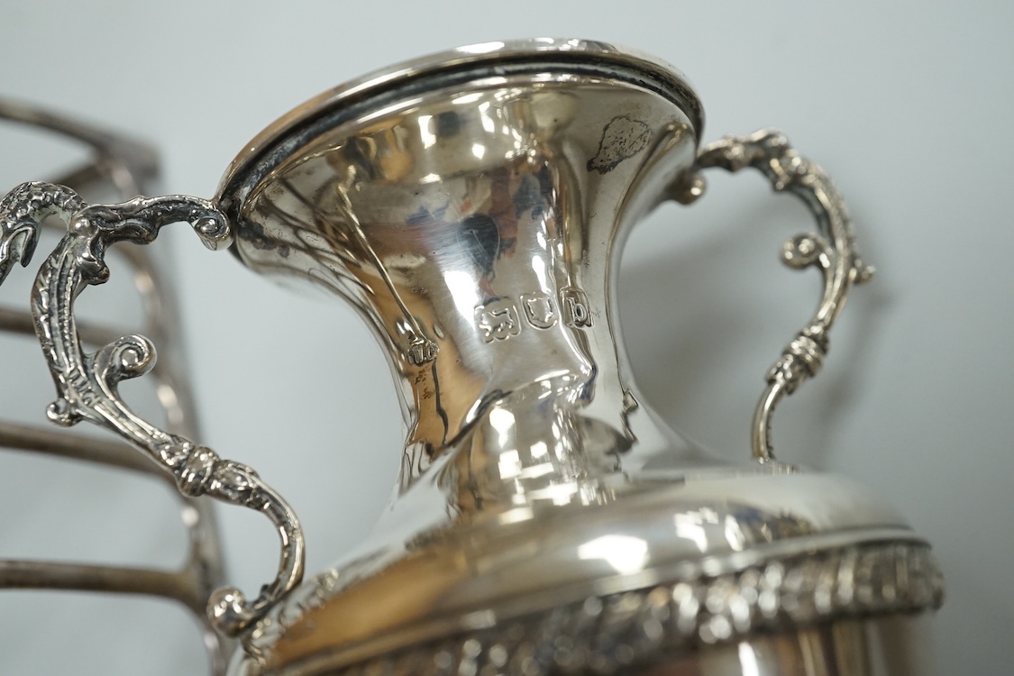 A pair of Edwardian silver mounted whisky noggins by J & J Maxfield Ltd, Birmingham, 1908, one damaged and a pair of matching silver 'Whisky' wine labels, together with a pair of late Victorian silver posy vases by Willi